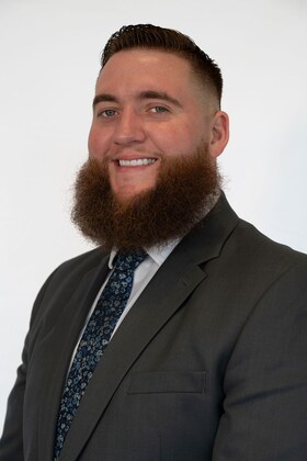 Staff member Russell Grant from ID_a9c9e33509c6