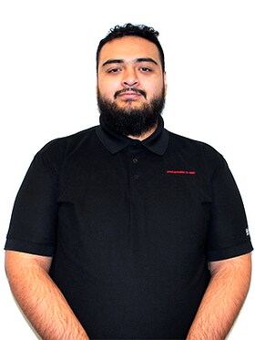 Staff member Juan Claros from ID_e9f05b1d3a7b