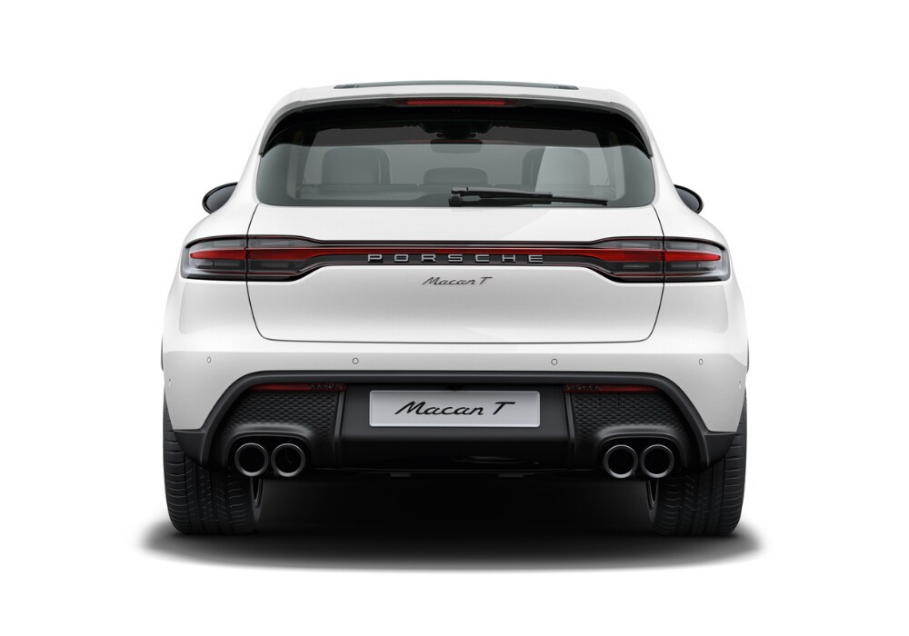 Rear view of a 2025 Porsche Macan in front of a white background
