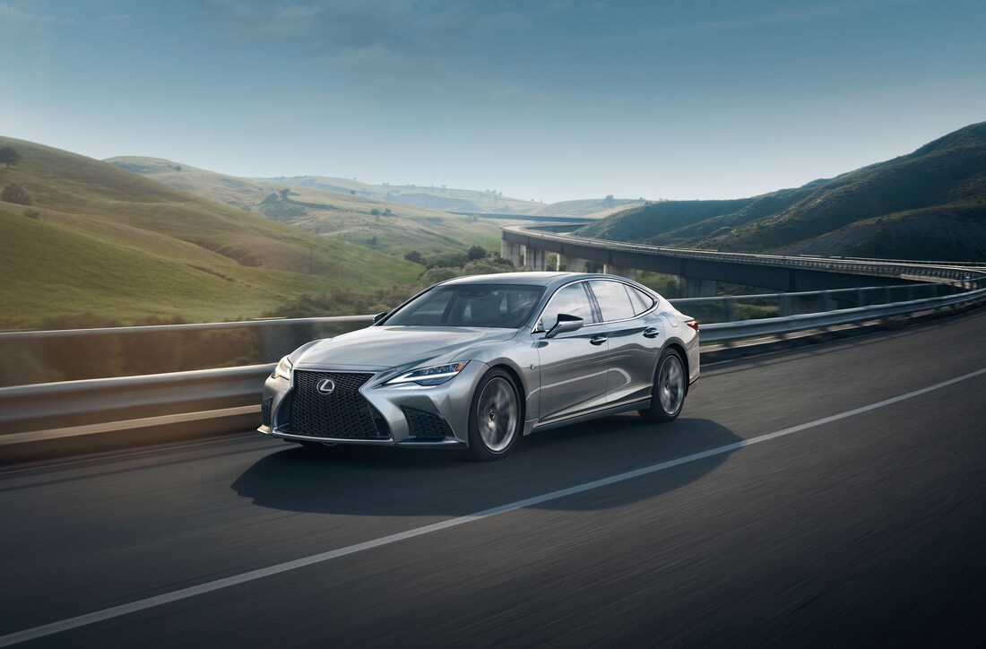 used Lexus LS sedan driving on a country road