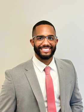 Staff member John De La Rosa from ID_16305ef1d584