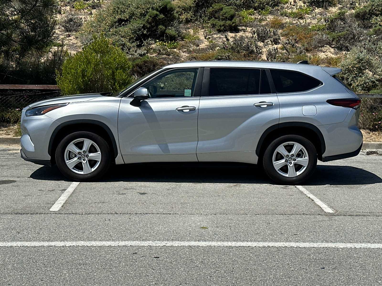 Used 2024 Toyota Highlander LE with VIN 5TDKDRAH9RS528023 for sale in Seaside, CA