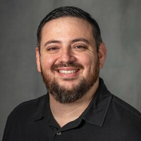 Staff member Max Newton from ID_96c95e1d5c8e