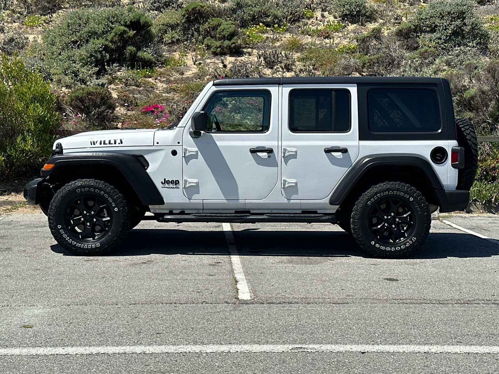 Used 2021 Jeep Wrangler Unlimited Willys with VIN 1C4HJXDG3MW648449 for sale in Seaside, CA