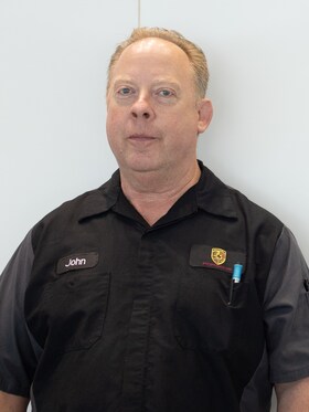 Staff member John Kraine from ID_15829ce4e490