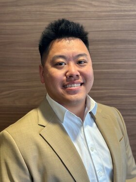 Staff member Kevin Lee from 4781af5e56d0