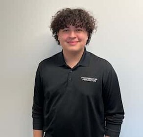 Staff member Xavier Negron from ID_731d6b