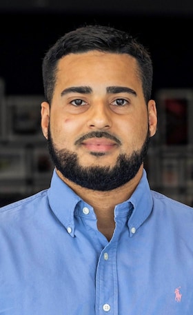 Staff member Lito Nunez from ID_215d94fbbdcc