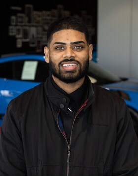 Staff member Aaron Alie from ID_6aa8599aa4ab