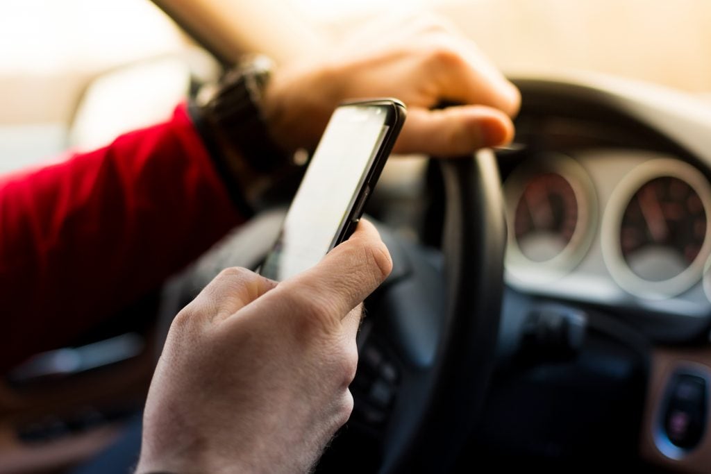 Your phone or other mobile devices can remain safely out of your hands while you are driving your new Porsche | Florida's new hands-free communication laws in Orlando FL