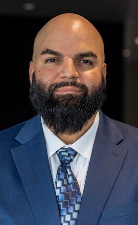 Staff member Eric Rodriguez from ID_11028e8a7397