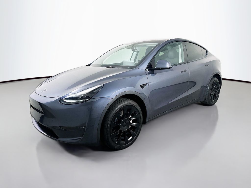 Used 2023 Tesla Model Y Long Range with VIN 7SAYGDEEXPA163549 for sale in Kansas City