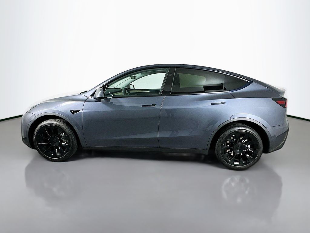 Used 2023 Tesla Model Y Long Range with VIN 7SAYGDEEXPA163549 for sale in Orlando, FL
