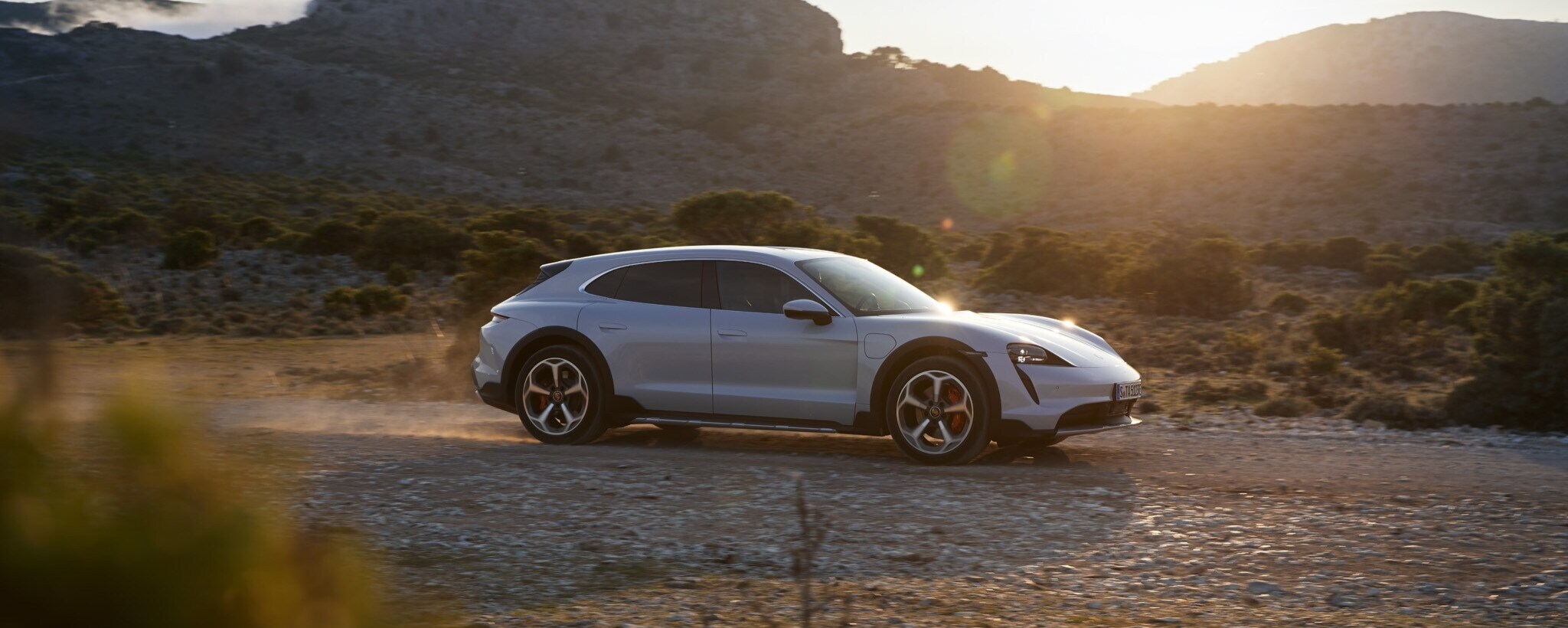 Porsche Taycan Cross Tourismo on dirt road