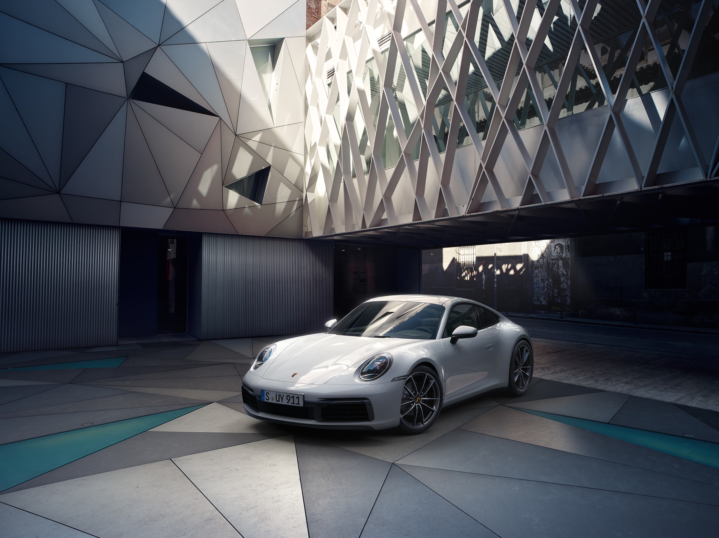 Porsche 911 Carrera parked in driveway