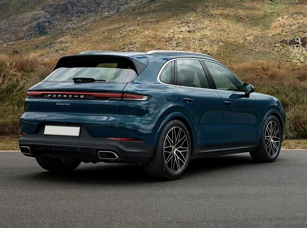 Porsche Cayenne driving on road