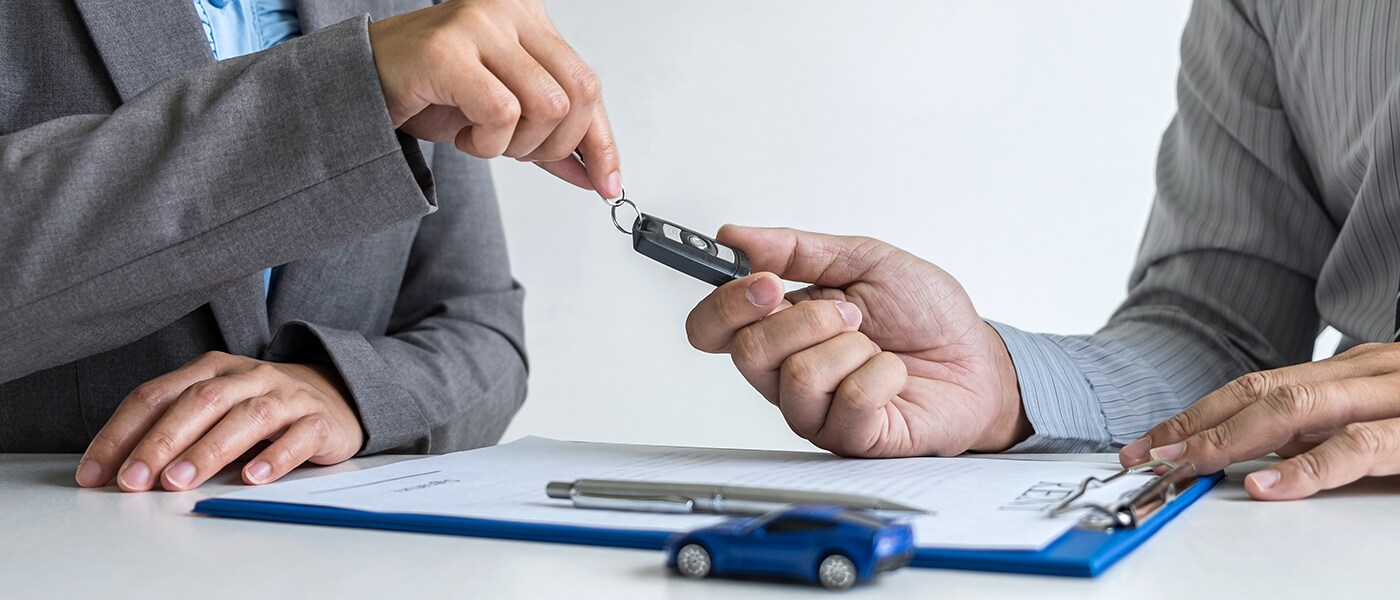 Getting the keys for your new car.