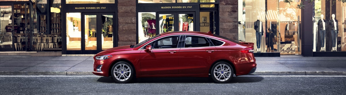 New Ford Fusion outside a city boutique