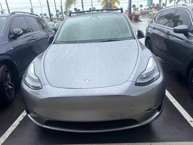Used 2025 Tesla Model Y Long Range with VIN 7SAYGDEE0SF299099 for sale in Miami Lakes, FL