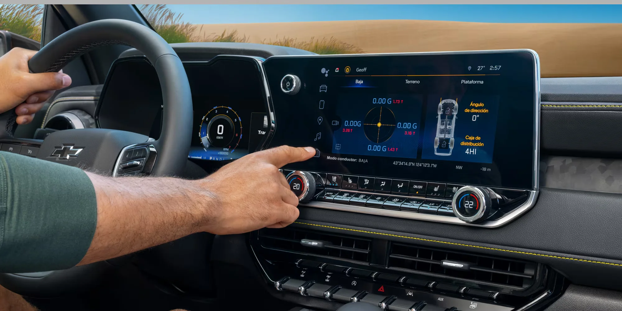 Driver using the Chevy Colorado 11.3-inch touchscreen with Google built-in