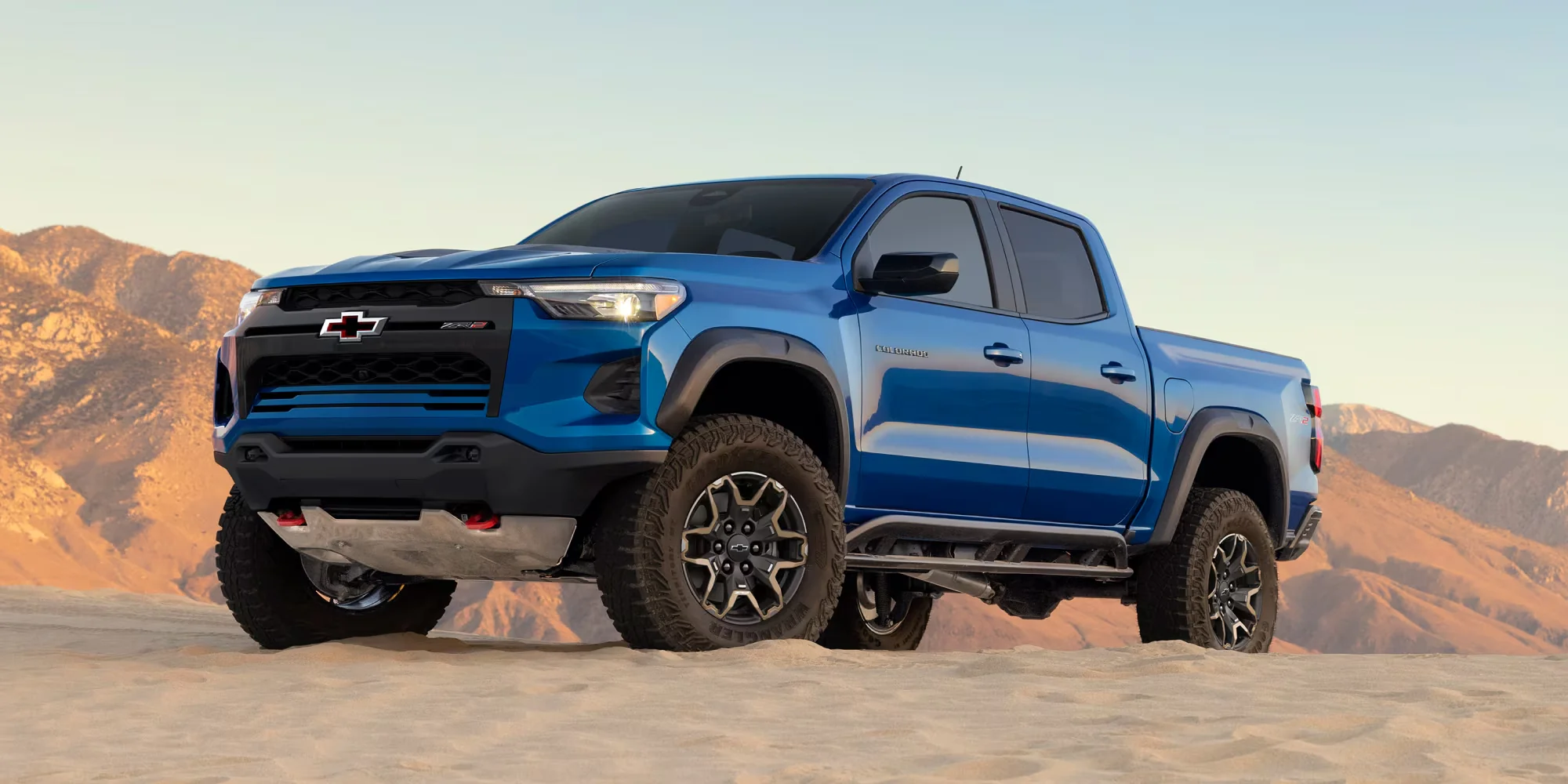 2026 Chevy Colorado in blue, front three-quarter view, at Powers Swain Chevrolet in Fayetteville, NC