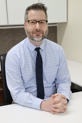 Staff member Andrew Dent from cc1b292d395f