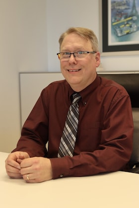 Staff member Paul Aldred from 4f38559a49b4