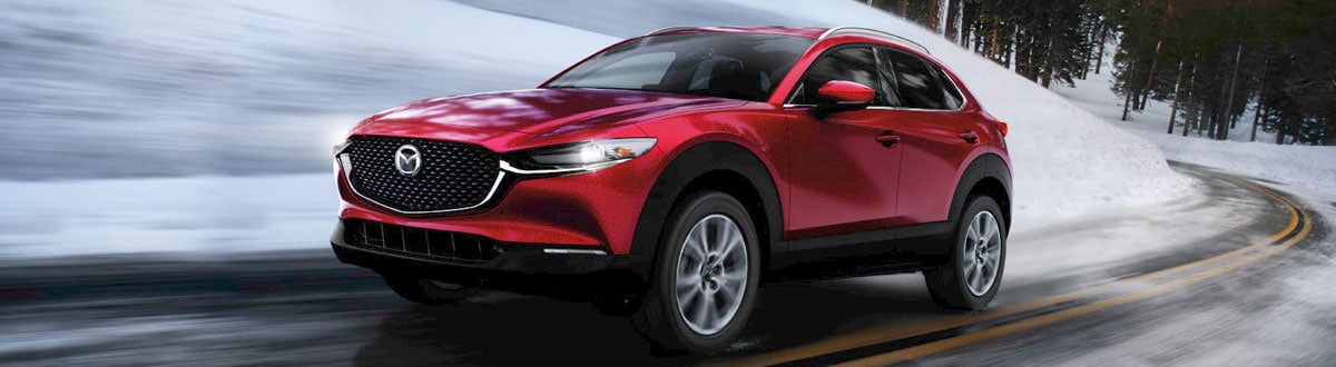 Mazda CX-30 Driving on a Snowy Day
