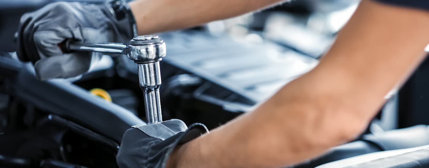 A mechanic is shown performing auto repair near you.