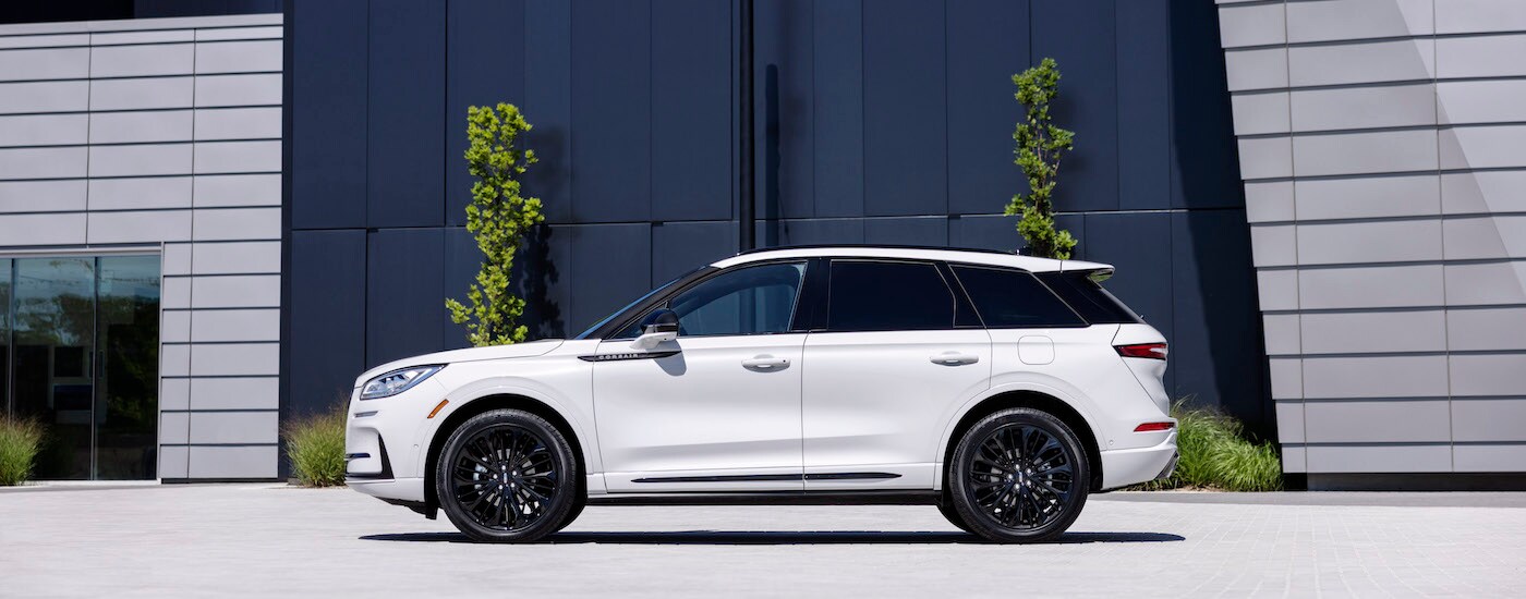 A white 2023 Lincoln Corsair is shown from the side.