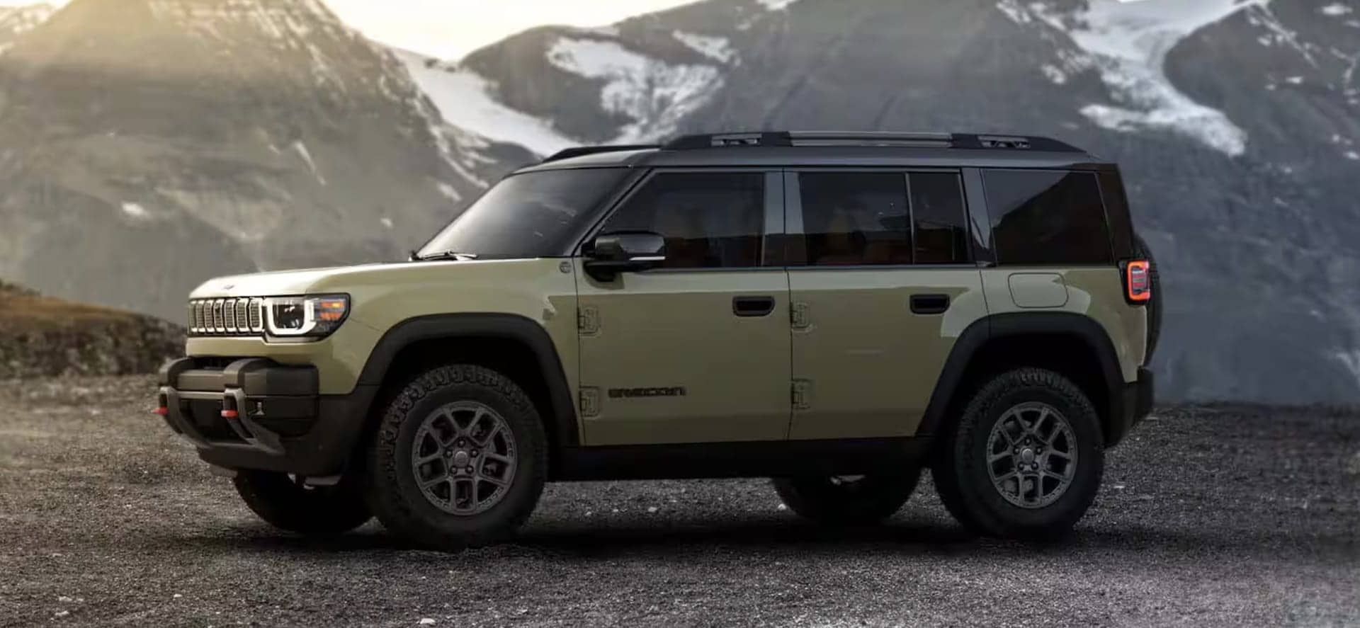 2026 Jeep Recon rear three-quarter view with the swing gate spare