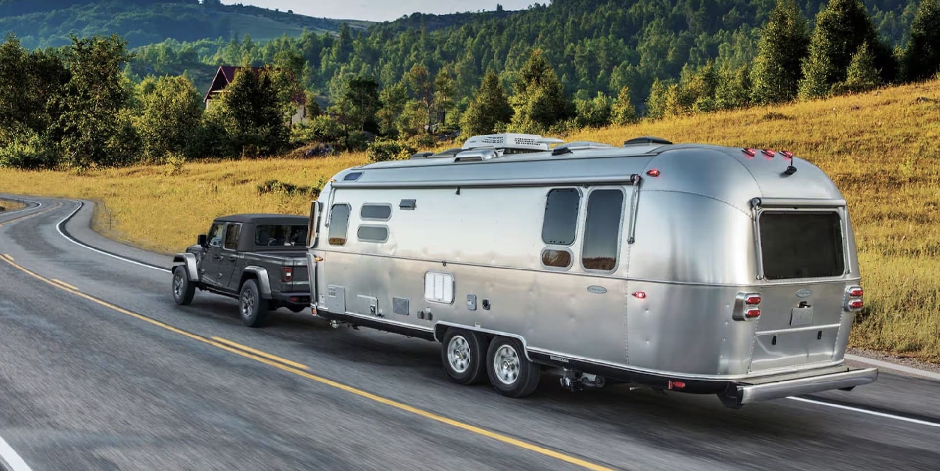 2026 Jeep Gladiator towing a trailer near Hyannis