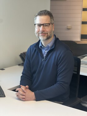Staff member Andrew Dent from ID_02602d2a84a4