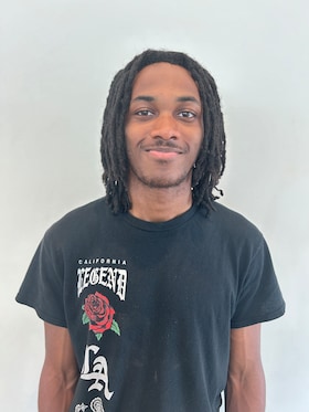 Staff member Ashton Burkes from ID_d053dde5b094