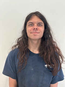 Staff member John Michael Burns from ID_a611a8d8df91