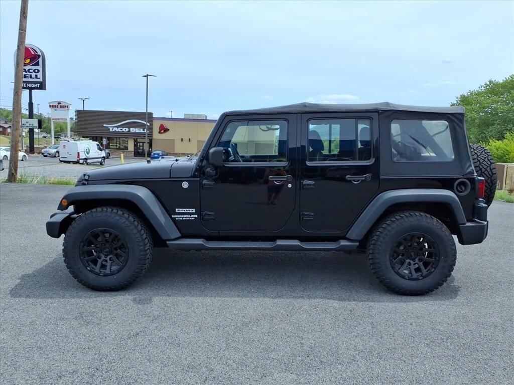 Used 2013 Jeep Wrangler Unlimited Sport SUV