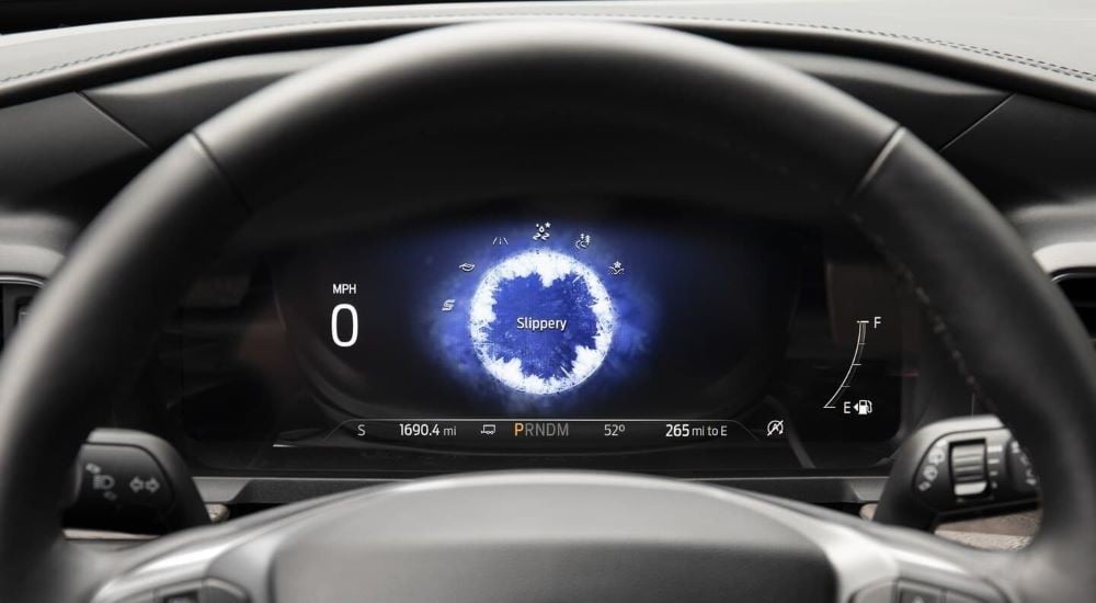 Close-up of the slippery mode display on the digital gauge in a 2021 Ford Explorer.