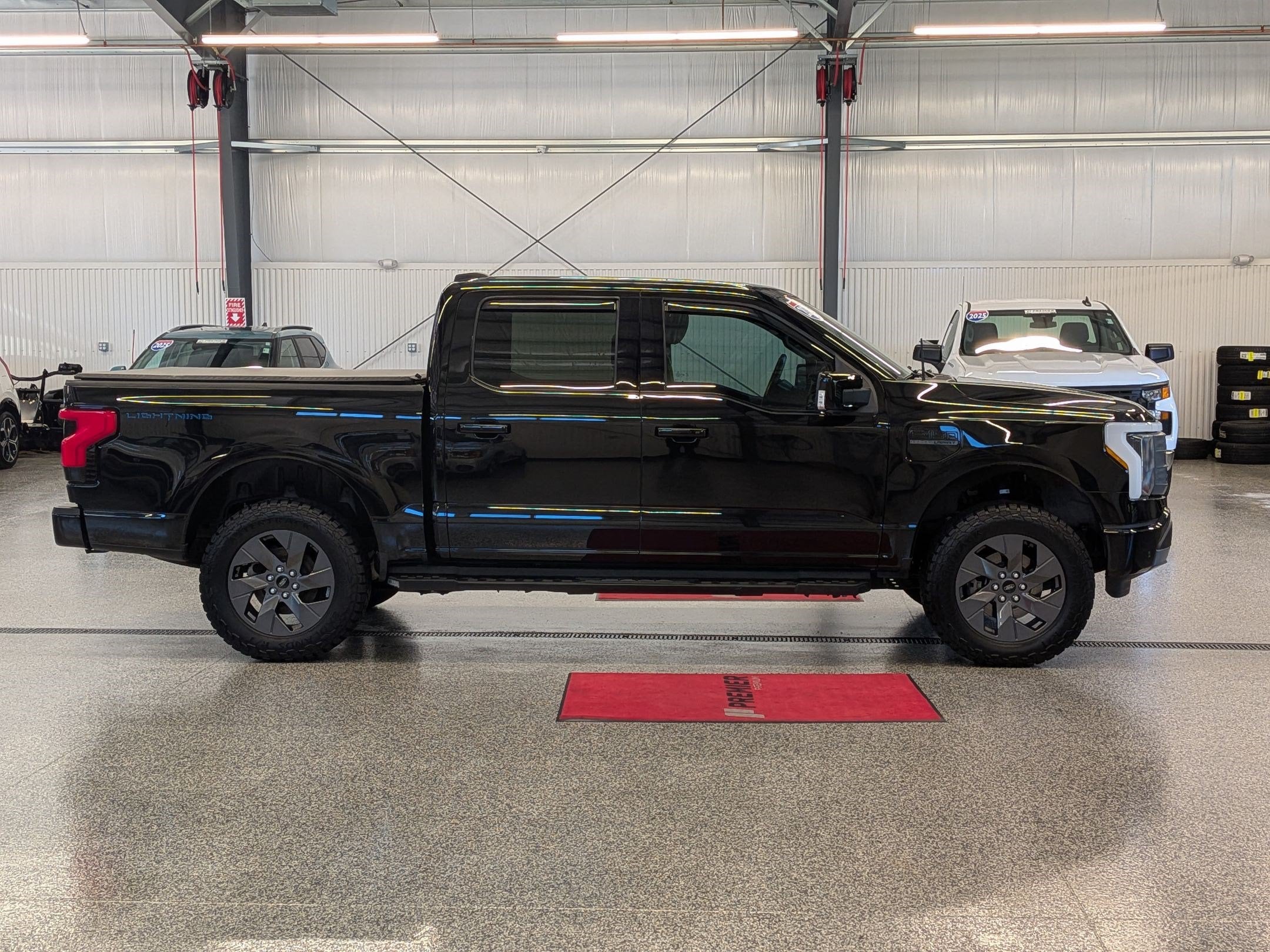 Used 2023 Ford F-150 Lightning Lariat with VIN 1FTVW1EL9PWG55469 for sale in Branford, CT