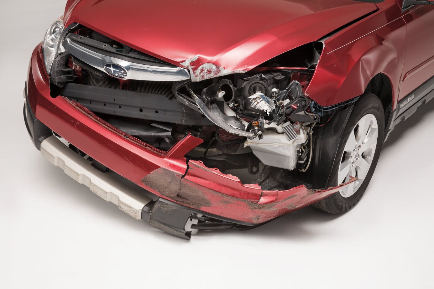 Subaru damaged in front end collision
