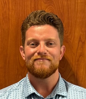 Staff member Samuel Waters from ID_25edf88e2fd2