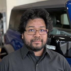 Staff member Lenny Sithong from ID_254945