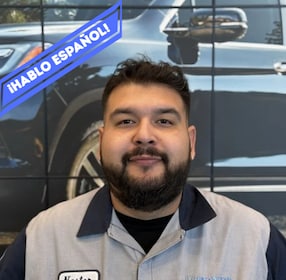 Staff member Nestor Gonzales from ID_83dfb1