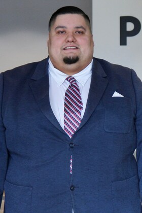 Staff member Alaric W. from 2be049ce52f6