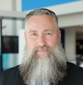 Staff member Conrad K. from bb0032e39b86