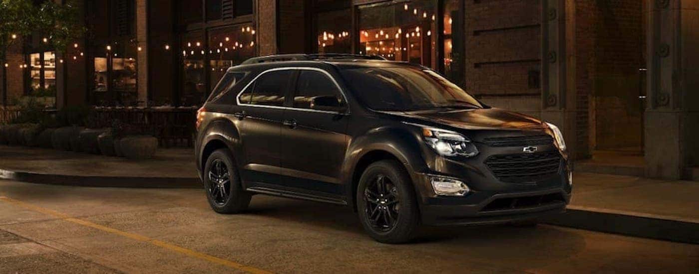 Black 2017 Chevy Equinox parked on the street
