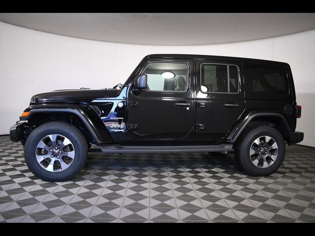 Used 2021 Jeep Wrangler Unlimited Sahara with VIN 1C4HJXEN5MW678680 for sale in Massillon, OH