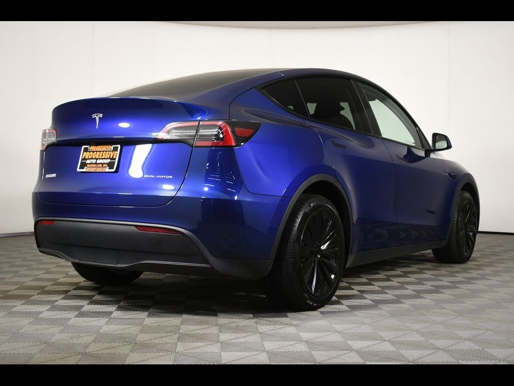 Used 2024 Tesla Model Y Long Range with VIN 7SAYGDEE5RA245465 for sale in Massillon, OH