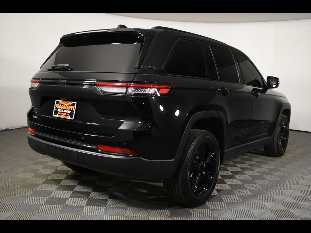 Used 2023 Jeep Grand Cherokee Altitude with VIN 1C4RJHAG9PC601284 for sale in Massillon, OH