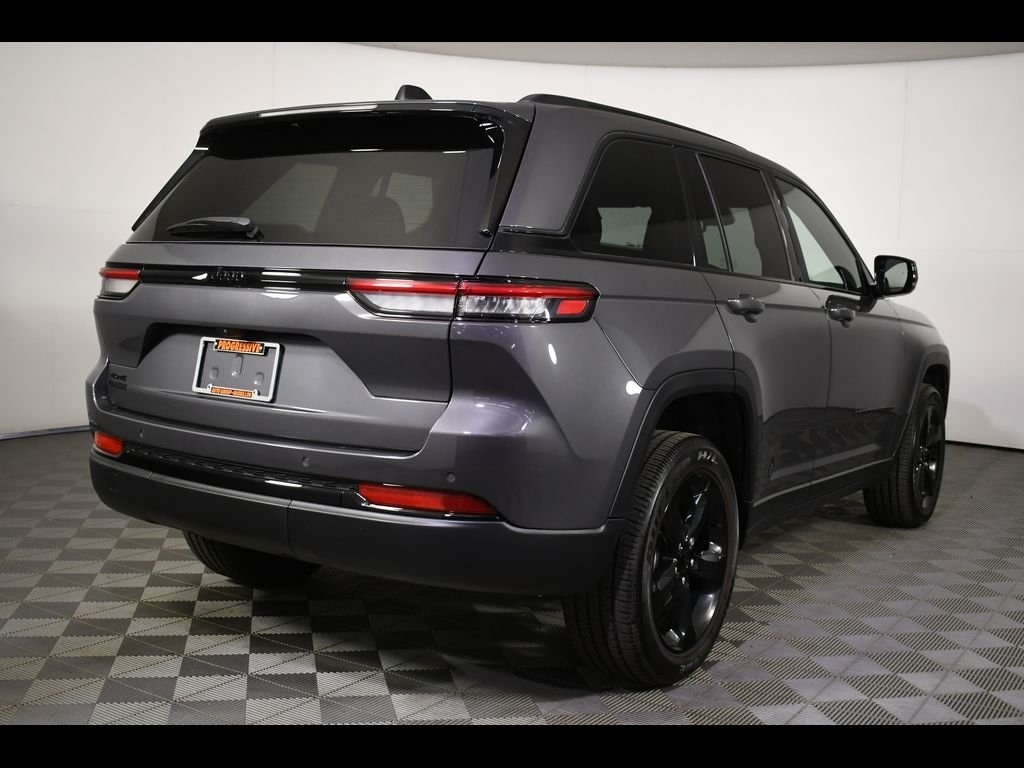 Used 2023 Jeep Grand Cherokee Altitude with VIN 1C4RJHAG8PC598880 for sale in Massillon, OH