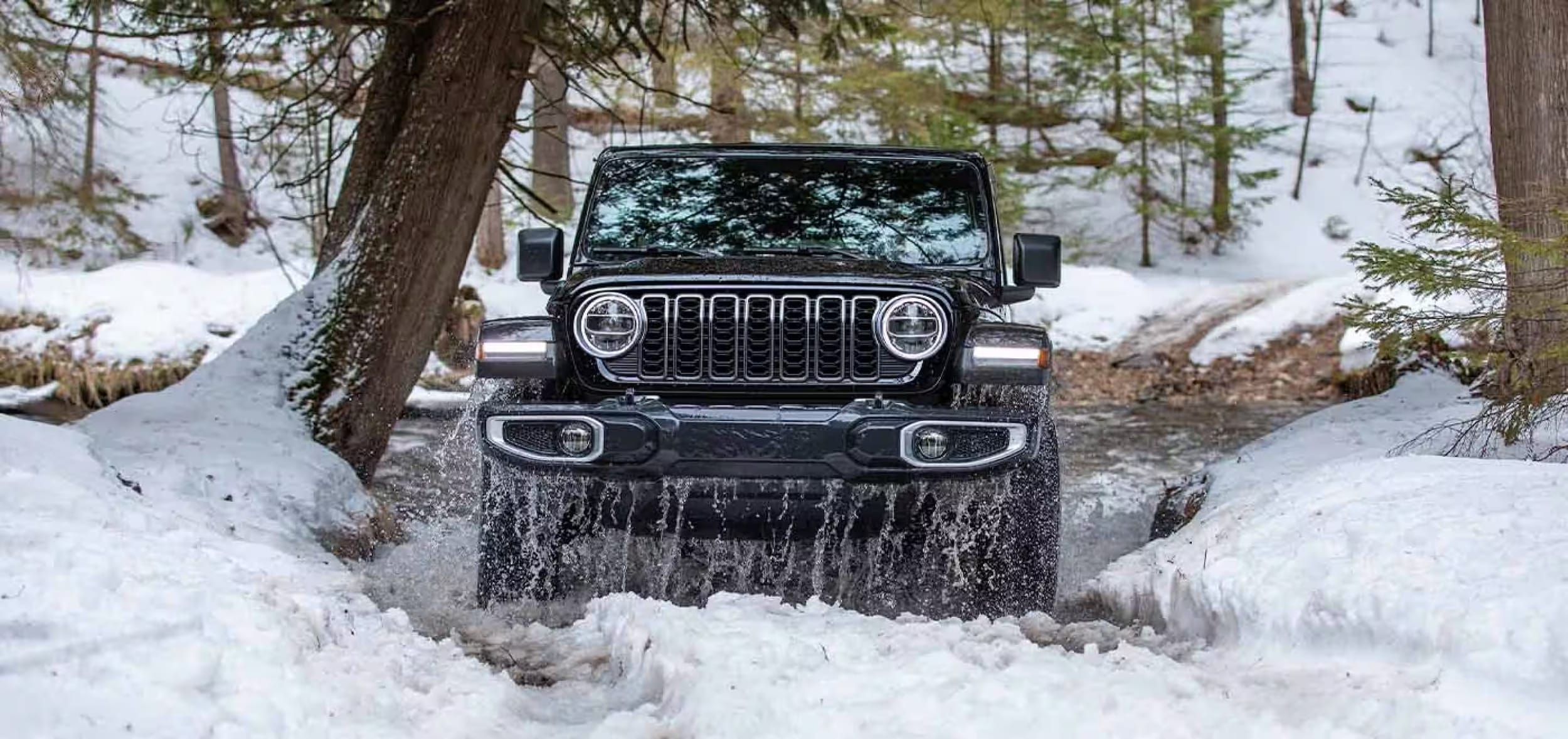 2026 Jeep Wrangler exterior profile on Ohio road Progressive Chrysler Dodge Jeep Ram in Massillon, OH